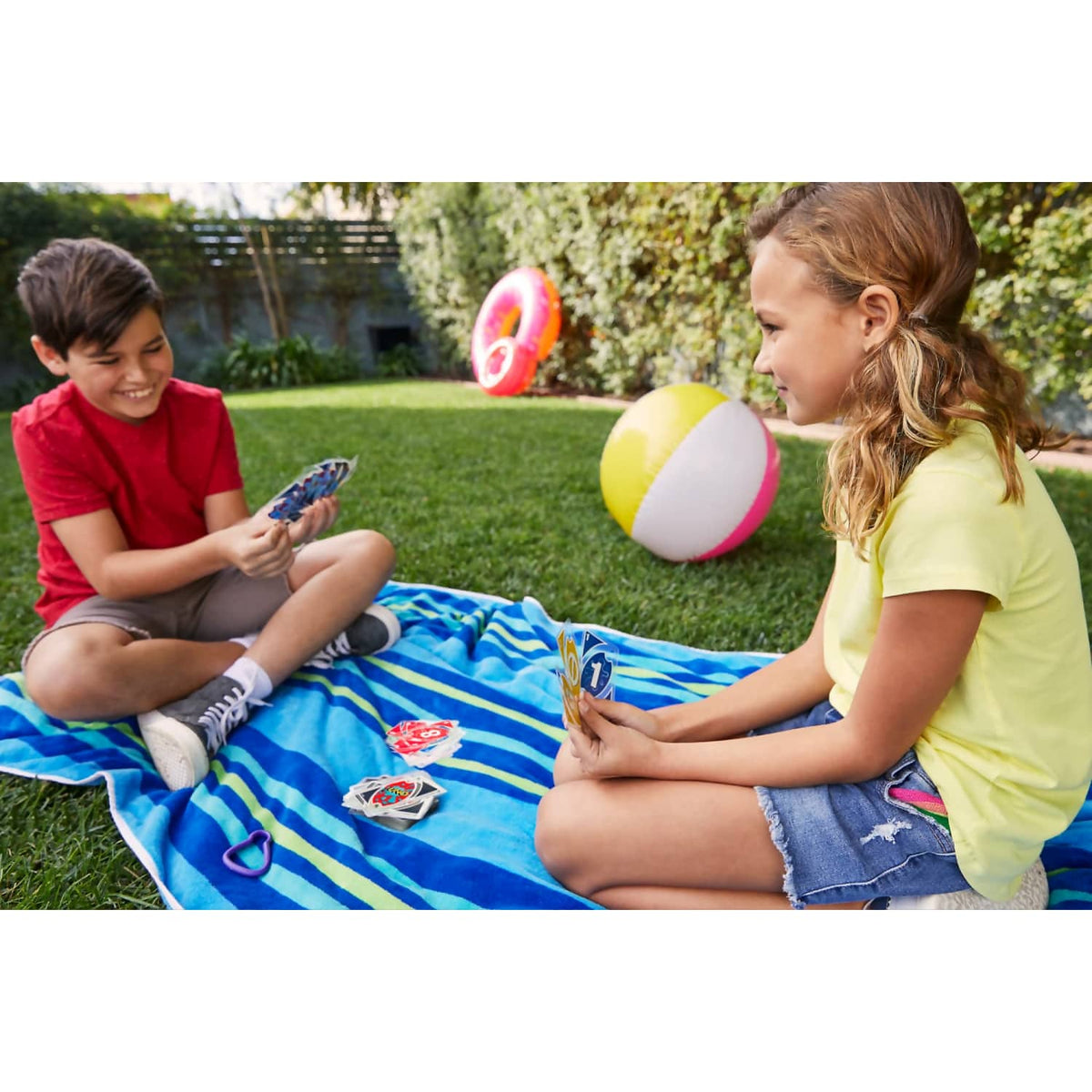 UNO - Splash Card Game With Waterproof Cards And Portable Clip For Travel